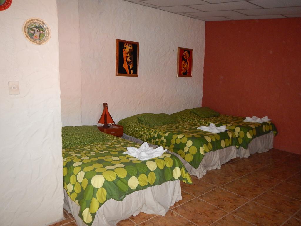 Hospedaje Casa Soleil Puerto Villamil Habitación foto