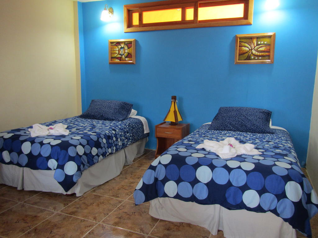Hospedaje Casa Soleil Puerto Villamil Habitación foto